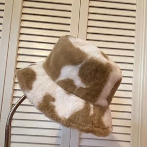 Fuzzy cow print bucket hat (never worn)